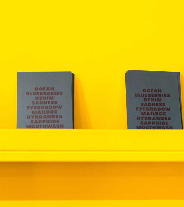 Books on a Yellow Wall